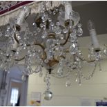 A gilt metal and cut glass six branch chandelier, height approx 80cm.