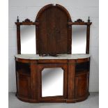 A 19th century walnut inlaid credenza with triple mirror back with curved carved top rail above a