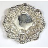 A Victorian hallmarked silver Art Nouveau pierced shallow bowl decorated with flowers and scrolls,