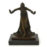 A hot cast bronze figurine of an Art Deco dancer with flowing robes and on marble base,