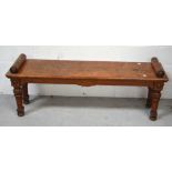 A 19th century Scottish oak hall bench with faux pillow rolls to either end on turned legs and