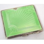 A George VI hallmarked silver and apple green guilloché compact, Birmingham 1932, approx 3.