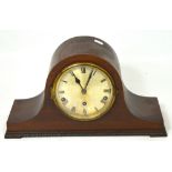 A mid 20th century mahogany cased Napoleon hat clock, the gilded dial set with Roman numerals,