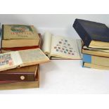 Twelve albums of stamps to include a Schauber album of stamps, Dutch Indies, Japan, Indian Ecuador,