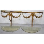 A pair of ornate gilt metal and onyx demi-lune console tables for wall mounting,