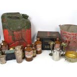 A collector's lot comprising vintage green and red petrol canister, an A.R.P.