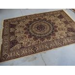 A reproduction beige ground Keshan rug, 200 x 140cm.