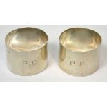 A cased set of George V hallmarked silver napkin rings, Birmingham 1927, approx 2.1ozt (2).