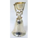 A Gorham silver bell with swing cup to the top, marked sterling, approx 3ozt, height 14cm.
