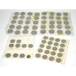 A quantity of 50 pence pieces and a large quantity of Churchill commemorative coins.