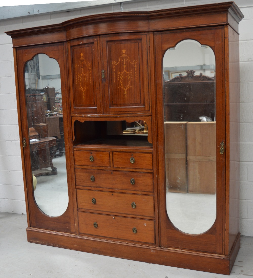 A c1900 mahogany and inlaid break front combination wardrobe/chest of drawers,