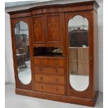 A c1900 mahogany and inlaid break front combination wardrobe/chest of drawers,