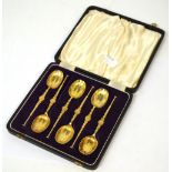 A cased set of George VI silver gilt teaspoons, Birmingham 1936, maker D V Chapman,