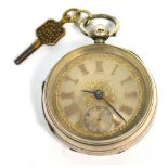 A hallmarked silver open face pocket watch the silver and gilded dial set with Roman numerals,