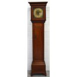 An 18th century oak eight day longcase clock the gilt dial set with Roman numerals and inscribed