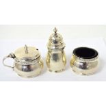 An Elizabeth II hallmarked silver cruet set to include pepper pot,