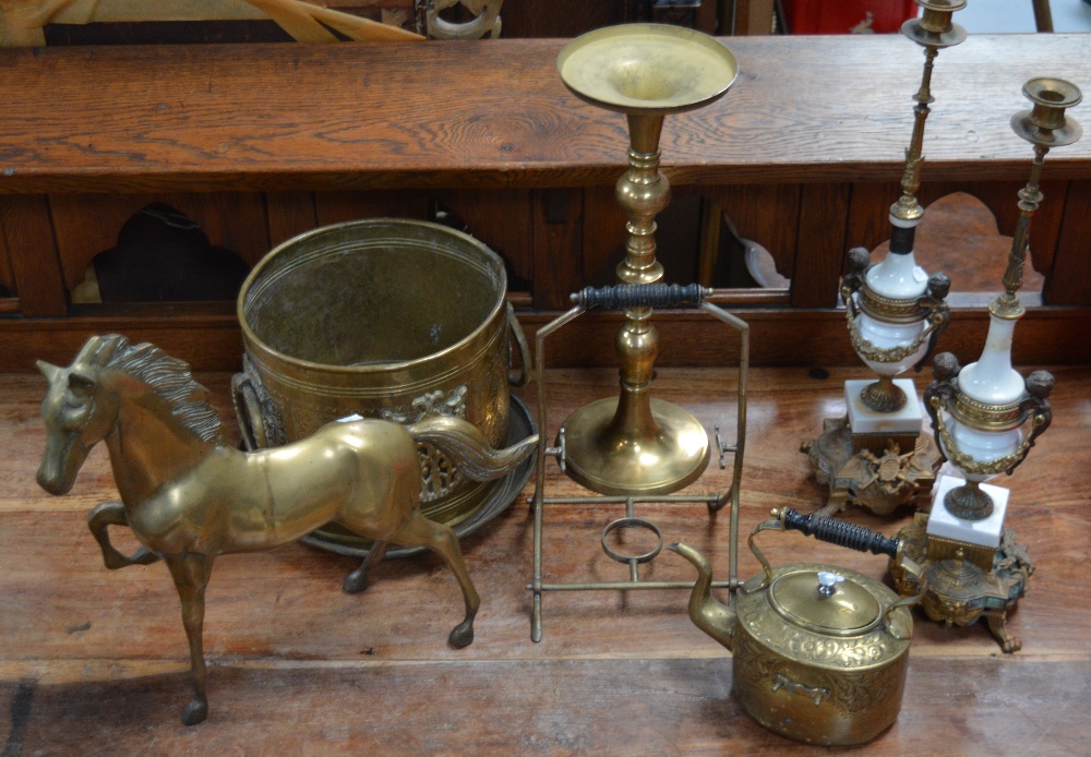 A collection of brassware to include a large model of a horse, a jardinière, a spirit kettle,