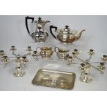 A Mappin & Webb plated four part tea service comprising a teapot, hot water jug,
