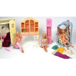 A quantity of Barbie and Sindy dolls and accessories to include a boxed shower and a wardrobe with
