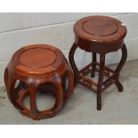 Two Chinese hardwood circular low stools.