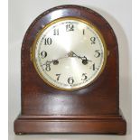 An early 20th century mahogany cased eight day mantel clock,