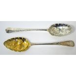 A George III hallmarked silver gilt berry spoon,