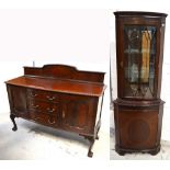 A reproduction mahogany sideboard on ball and claw feet,