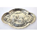 A Victorian hallmarked silver oval pin dish, decorated with putti, London 1898,