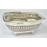 A Victorian hallmarked silver swing handled basket on ball feet, Sheffield date mark rubbed,