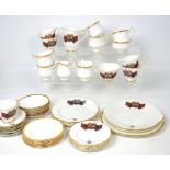 A part Royal Albert white and gilt heightened tea service and a quantity of Royal Grafton tartan