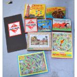 A collection of games and jigsaws to include Monopoly, Solitaire, Totopoly, Bezique etc,