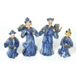 Four blue and white Oriental style Continental nodding head figures, parents with boy and girl,