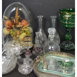 A quantity of glassware to include cut glass decanters, a tantalus with two decanters,