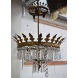 A gilt metal and cut glass ceiling pendant with cut glass prism style drops.