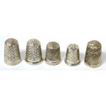 Five hallmarked silver Charles Horner thimbles of varying sizes, various dates (5).