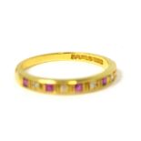 An 18ct yellow gold eternity ring set with small pink and white stones, size N, approx 2.2g.