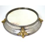 An Edwardian plated and mirrored table centre, diameter 42cm.