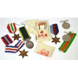 Five WWII medals to include the Italy Star, the 1939-45 Star, a France and Germany Star,