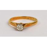 An 18ct yellow gold and brilliant cut diamond solitaire ring,