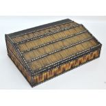 A mid 19th century Anglo-Indian porcupine quill and ivory detailed ebony writing slope of