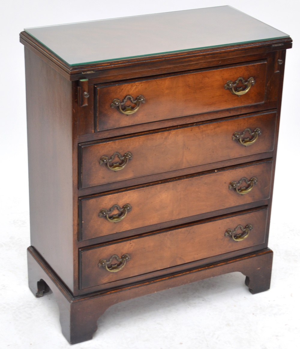 A small reproduction mahogany chest,