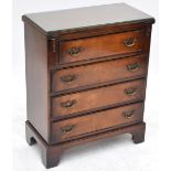A small reproduction mahogany chest,