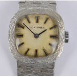 LONGINES; a 1970s sterling silver cased manual wind lady's wristwatch,