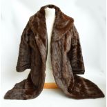 A lady's vintage full length silk lined fur coat.