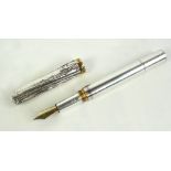 A limited edition Michel Audiard silver plated fountain pen for Charles Heidsieck,