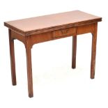 A Georgian mahogany foldover tea table of rectangular form with single drawer to one side,