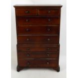 A 20th century miniature stained pine chest on chest raised on bracket feet, height 62.5cm.