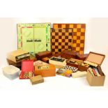 A collection of various vintage boxed chess sets to include three travelling examples,