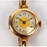 A lady's vintage 9ct gold cased wristwatch with circular dial set with Arabic numerals to the