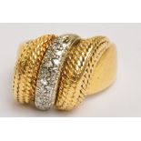 An 18ct yellow and white gold ring,